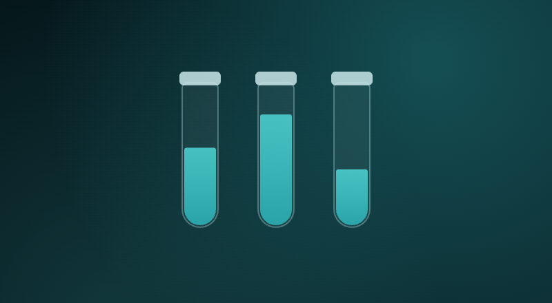 Three blood collection tubes with teal fill